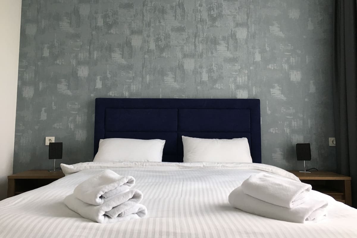 Apartment (Blue) | 1 bedroom, premium bedding, Select Comfort beds, individually decorated