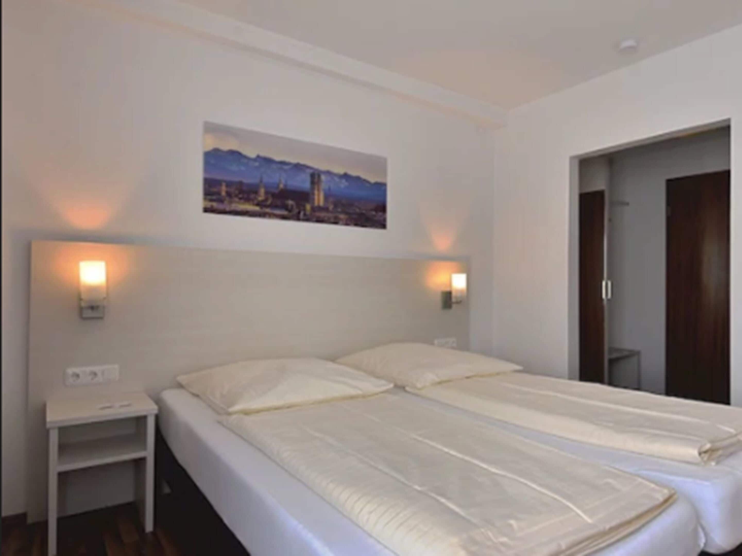 Comfort-Doppelzimmer | Hochwertige Bettwaren, Schreibtisch, kostenlose Babybetten