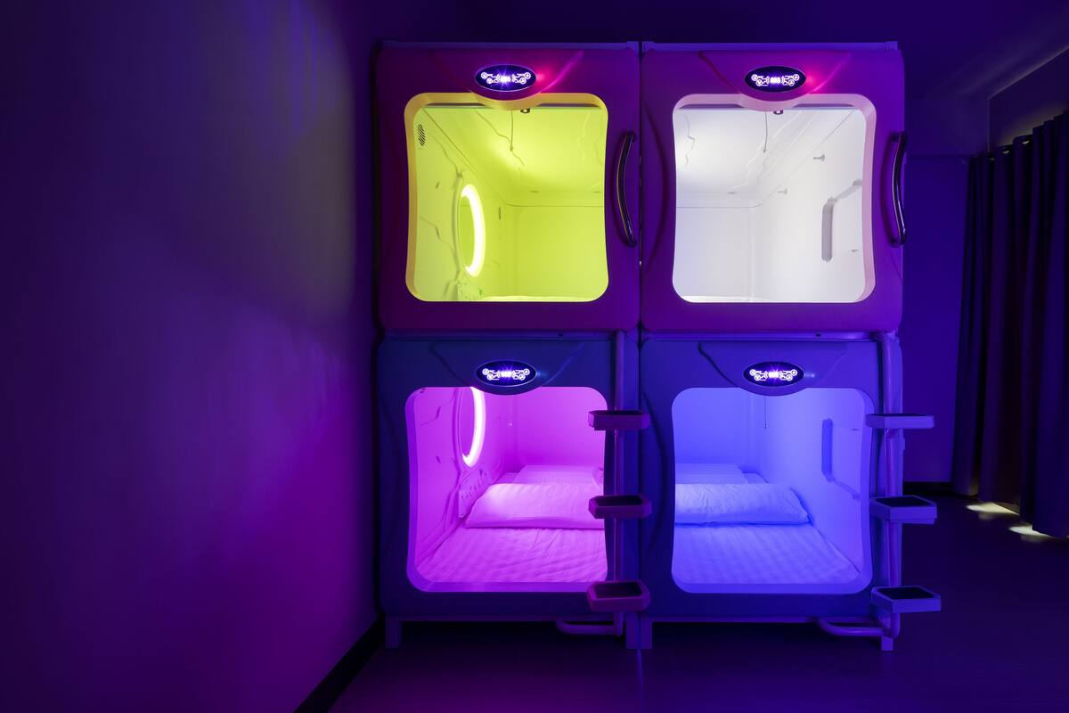 Chambre Élite, Plusieurs lits | Accès au Wi-Fi (inclus), décor unique, literie fournie