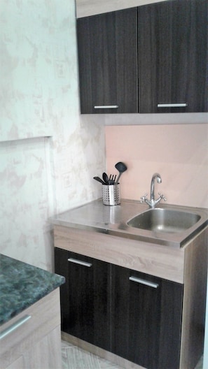 Standard Apartment, 2 Bedrooms | Shared kitchen | Fridge, stovetop, electric kettle, cookware/dishes/utensils