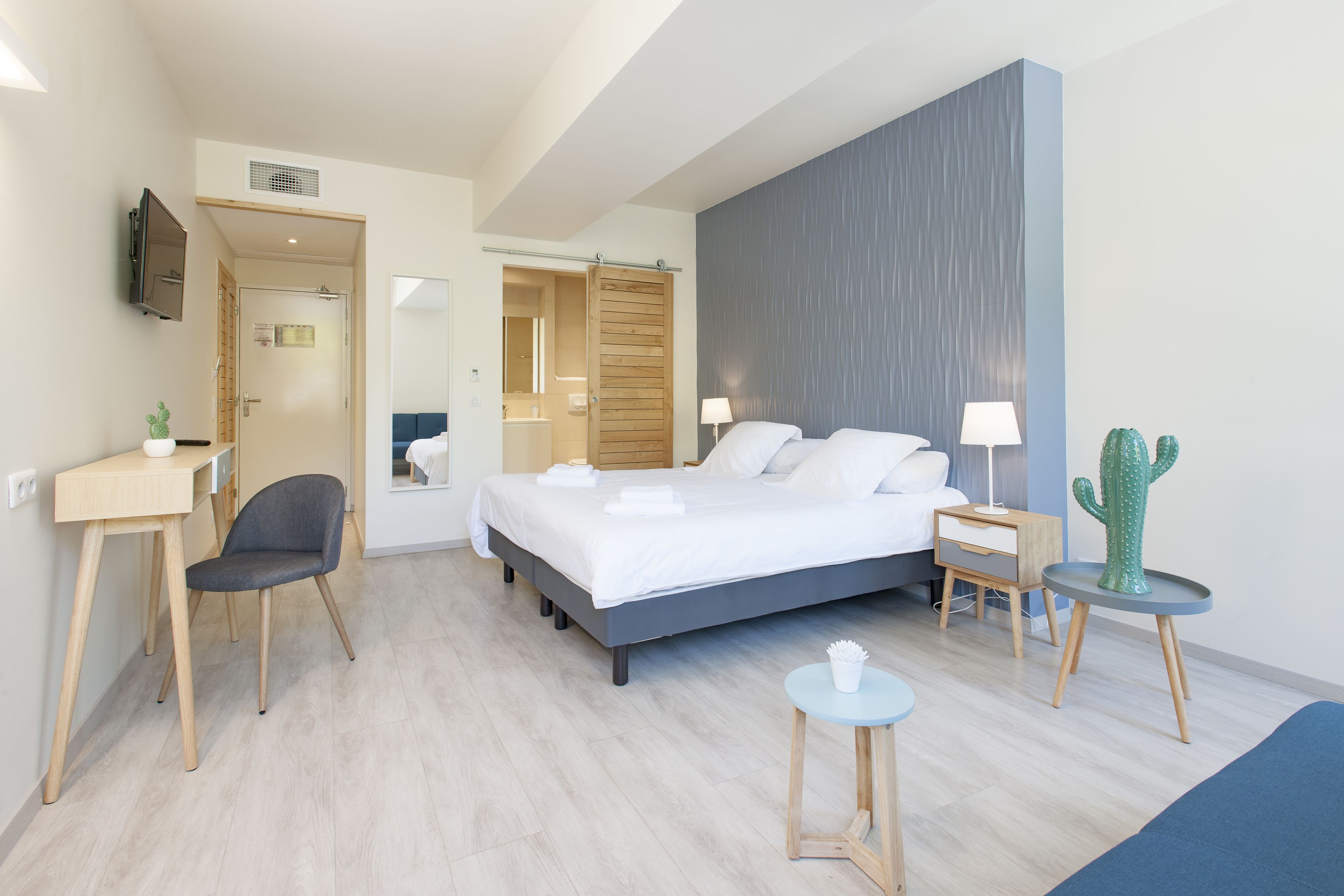 Chambre Deluxe | Minibar, coffres-forts dans les chambres