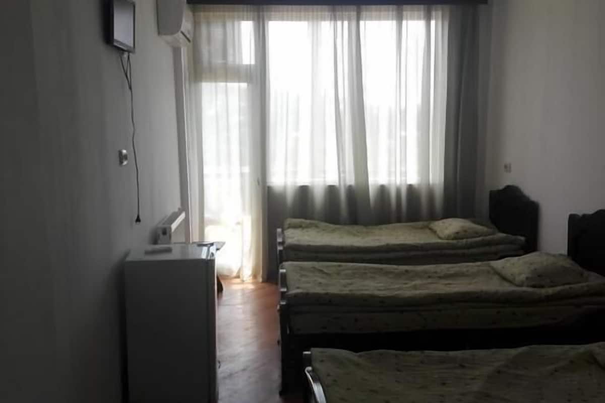 Family Room, Private Bathroom | Soundproofing, iron/ironing board, WiFi (free), bed sheets