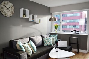Apartment, 1 Doppelbett und Schlafsofa, Terrasse | Wohnbereich