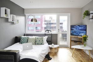 Appartement, 1 tweepersoonsbed met slaapbank, terras | Woonkamer | Flatscreentelevisie