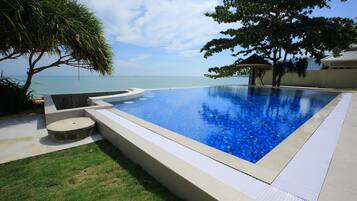 Outdoor pool, open 8:00 AM to 10:00 PM, pool umbrellas, sun loungers