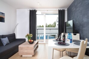 Superior appartement (2) | Woonkamer | Flatscreentelevisie