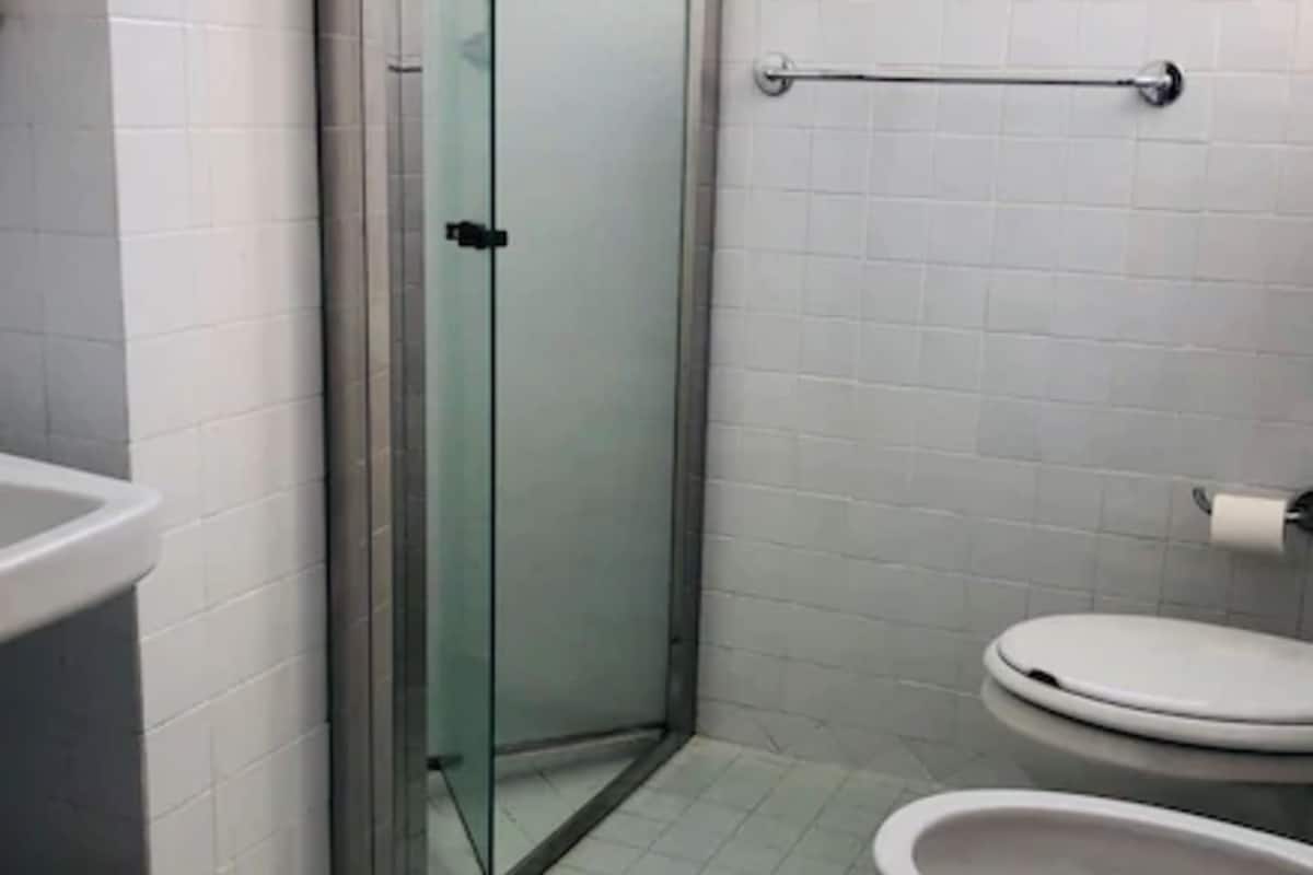 shower, rainfall showerhead, bidet, towels