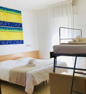 Quadruple Room | Minibar, soundproofing, cribs/infant beds, free WiFi - Hotel Montecarlo (Riccione)
