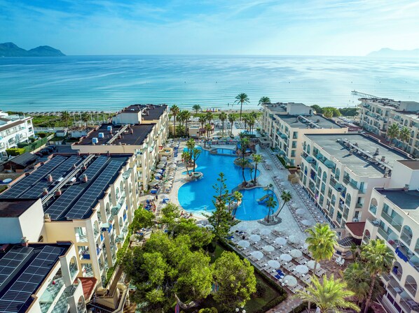 2 outdoor pools, open 10:00 AM to 6:00 PM, pool umbrellas, pool loungers