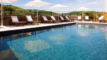 Seasonal outdoor pool, pool umbrellas, sun loungers