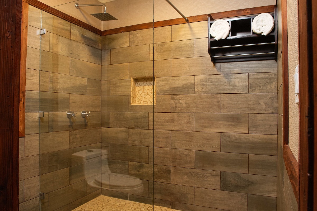traditional room | bathroom | shower, hair dryer, towels, soap