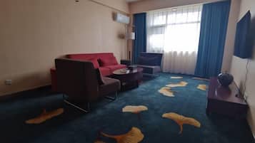 Down comforters, minibar, blackout drapes, iron/ironing board