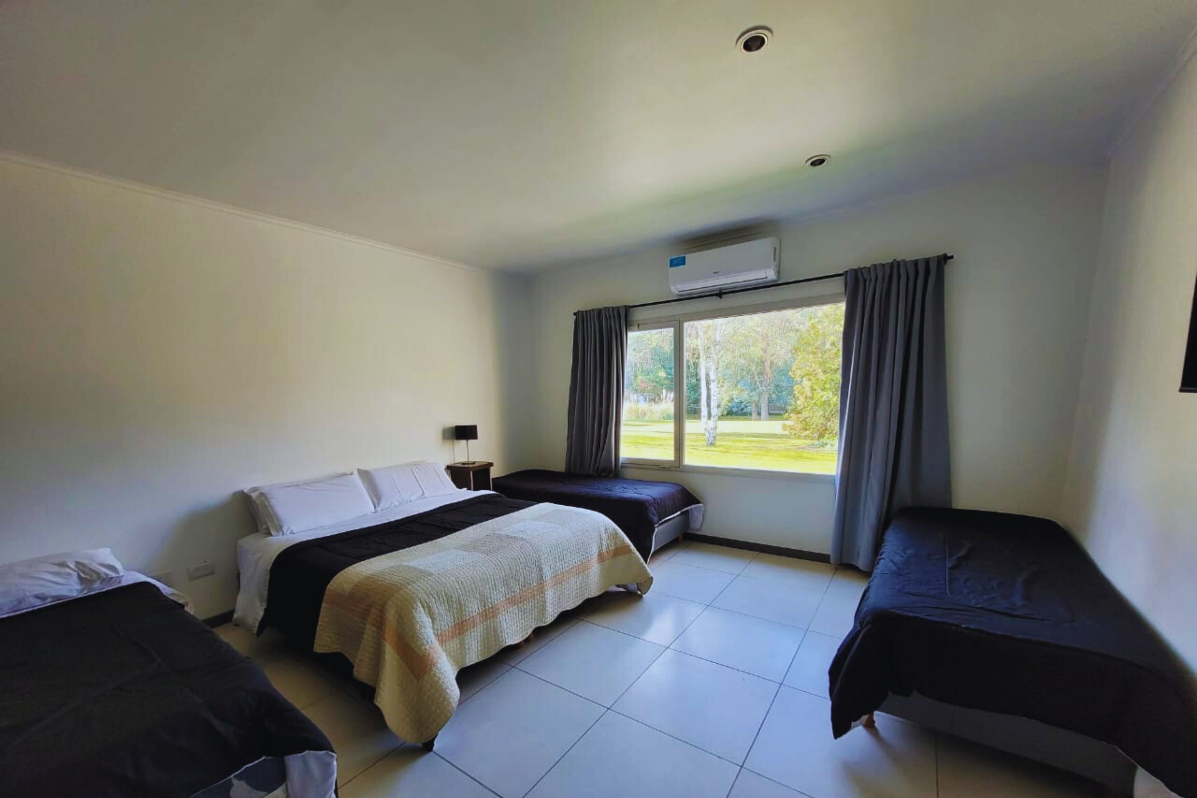 Standard Quadruple Room, 1 Bedroom, Non Smoking | Minibar, in-room safe, individually furnished, free WiFi