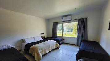 Standard Quadruple Room, 1 Bedroom, Non Smoking | Minibar, in-room safe, individually furnished, free WiFi