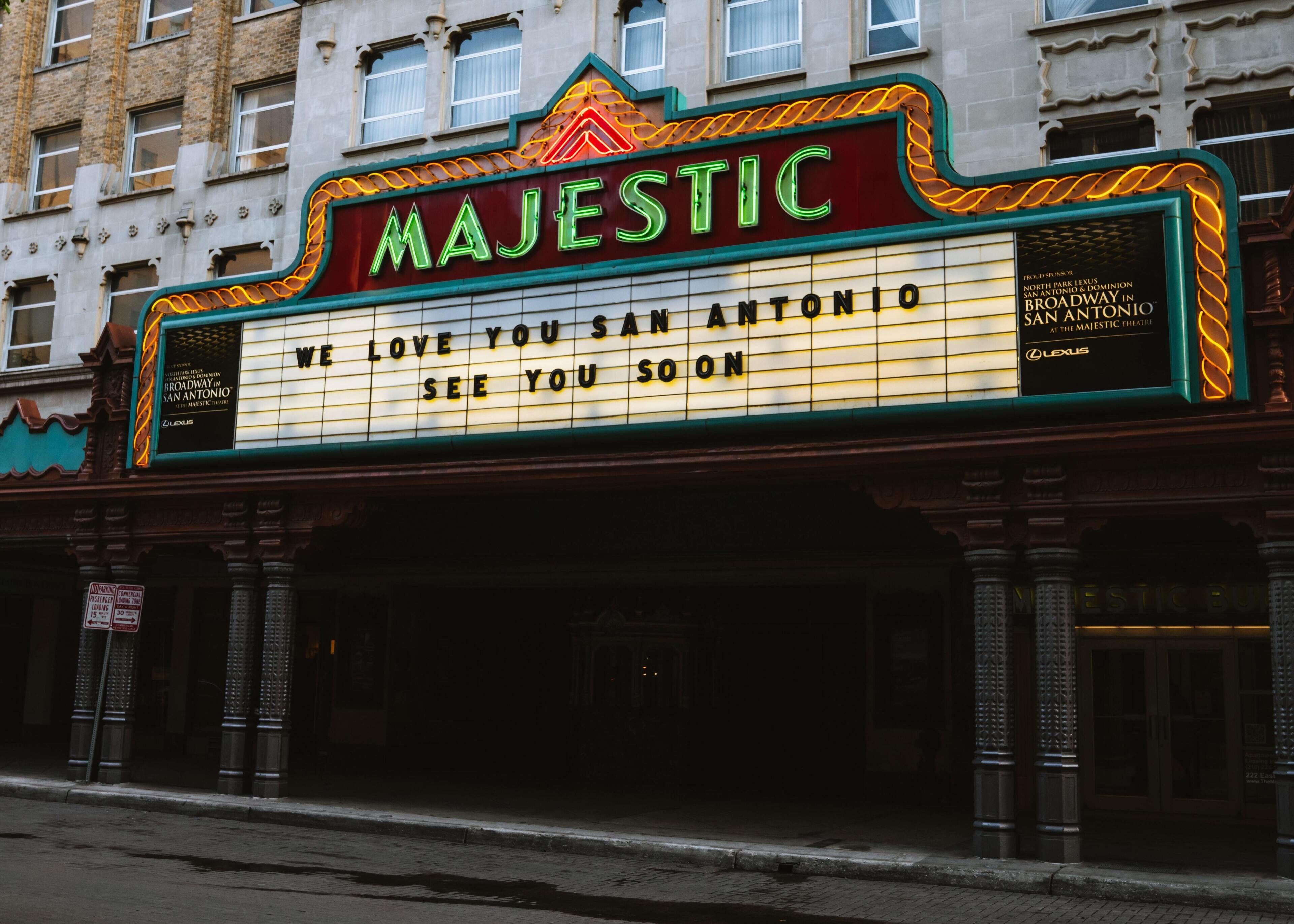 A theater marquee with the name "MAJESTIC" and the text "WE LOVE YOU SAN ANTONIO SEE YOU SOON".