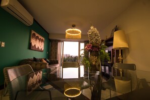 40-inch flat-screen TV with cable channels, TV - Niza Five Luxury Beach Apartments (Puerto Vallarta)