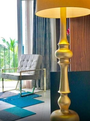 40-inch flat-screen TV with cable channels, TV - Niza Five Luxury Beach Apartments (Puerto Vallarta)