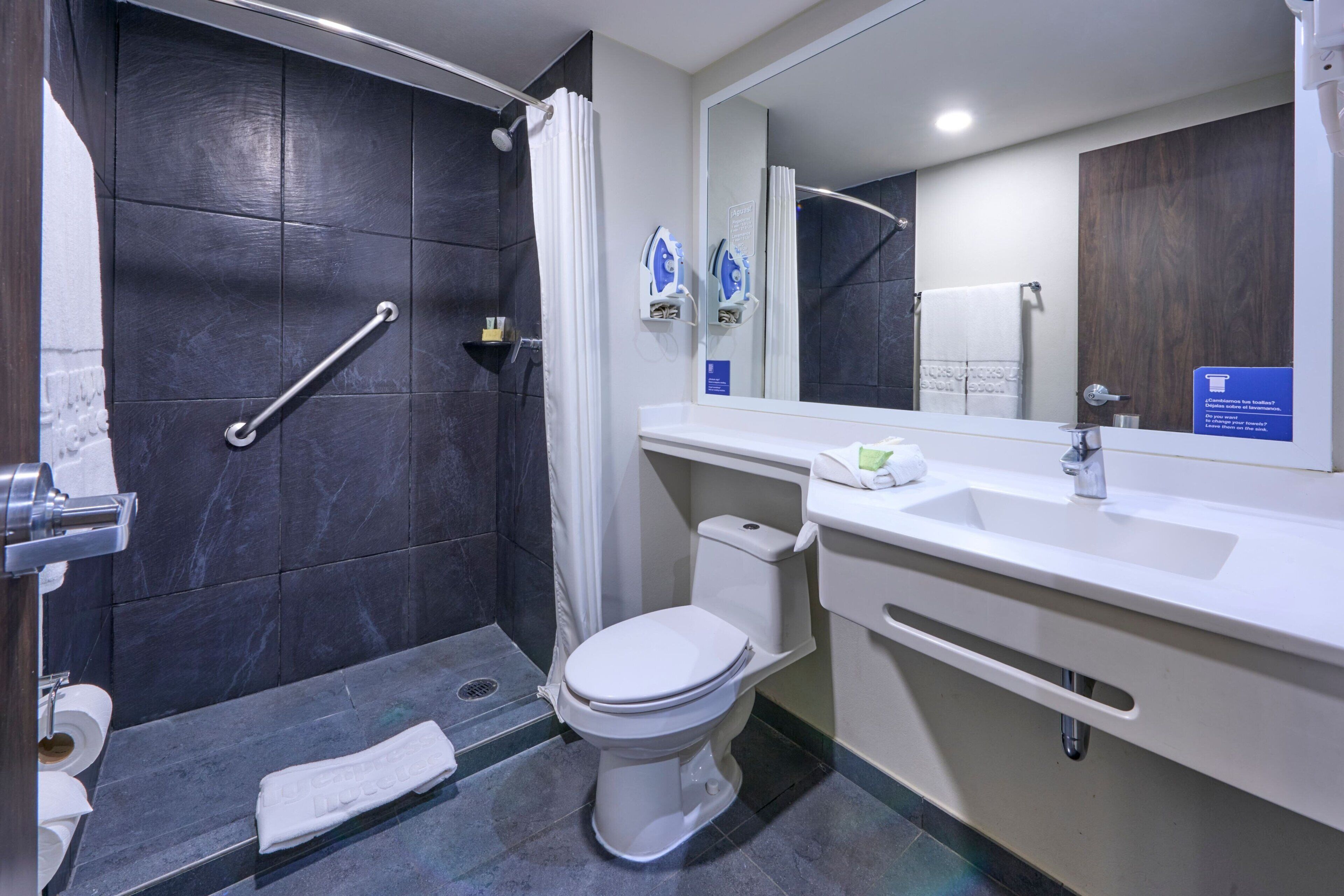 shower, free toiletries, hair dryer, towels