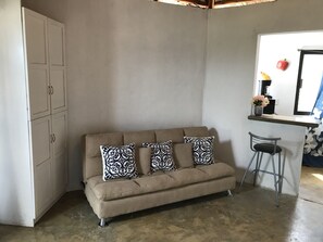 Bungalow panorámico, para no fumadores, vista al océano | 1 habitación, edredón, minibar y decoración personalizada 