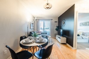 Executive Condo, 1 Bedroom, Balcony | Living area | 43-inch LED TV with cable channels, TV, Netflix - AOC Suites - Heart of Downtown  Condo (Toronto)