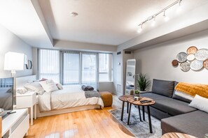 Deluxe Condo, Multiple Beds, Non Smoking | Living area | 43-inch LED TV with cable channels, TV, Netflix - AOC Suites - Heart of Downtown  Condo (Toronto)