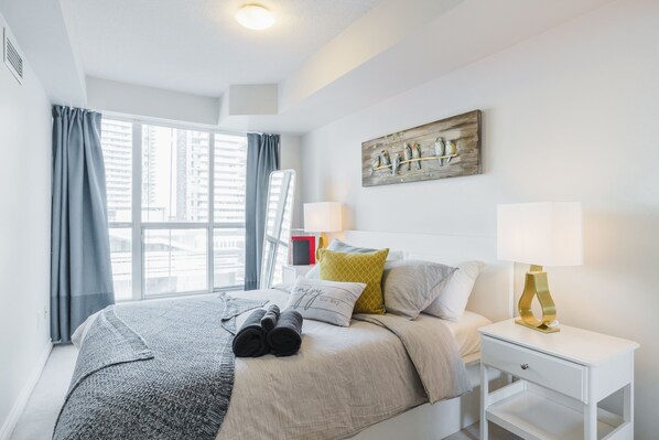 1 bedroom, premium bedding, laptop workspace, blackout drapes