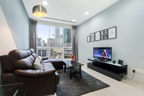 Business Apartment | Living room | LCD TV, Netflix - Binjai8 by Plush (Kuala Lumpur)