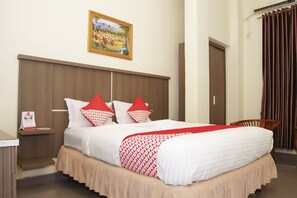 Habitación doble Deluxe | Escritorio, wifi gratis y ropa de cama 