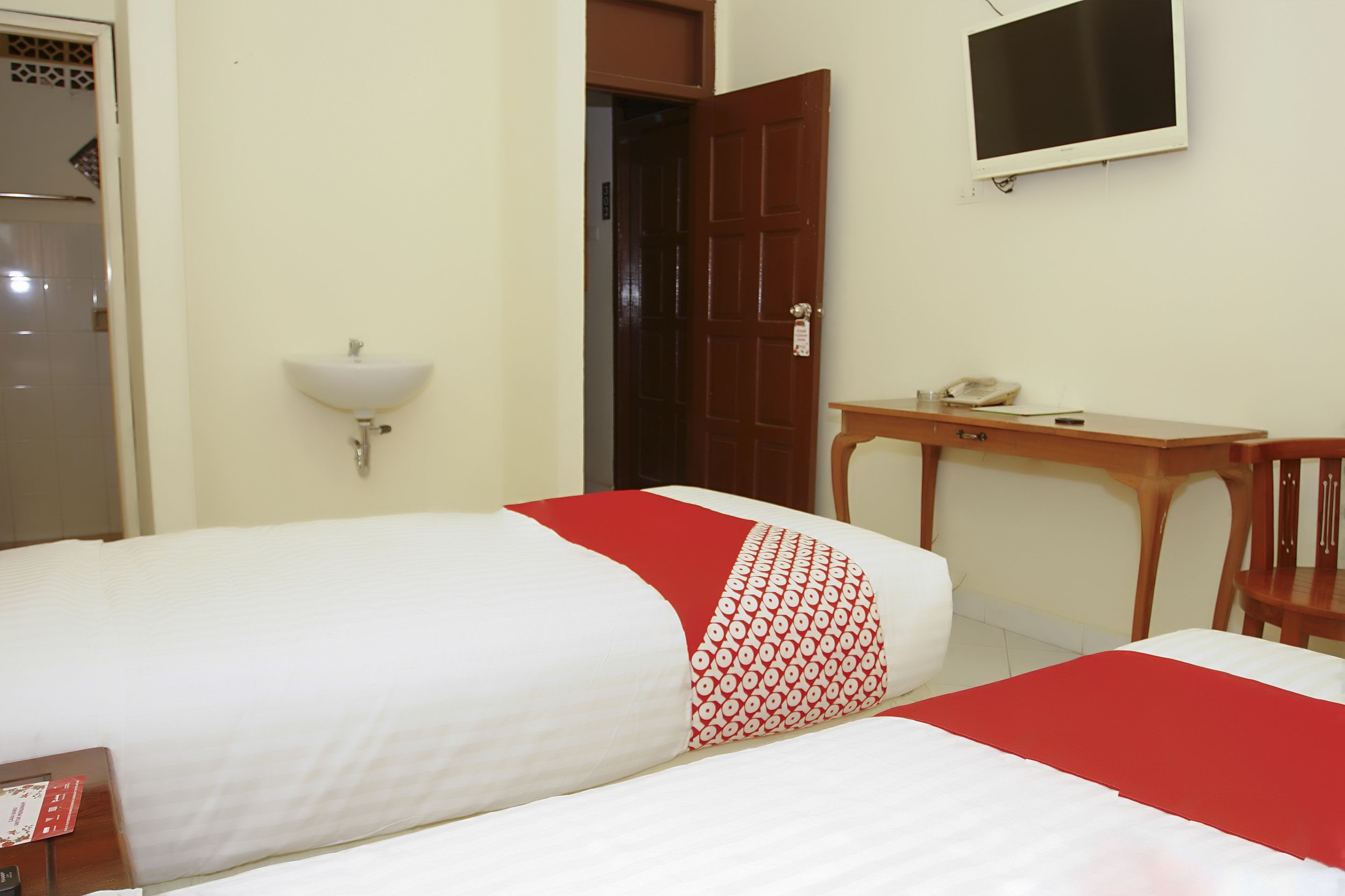 Foto - OYO 236 Penginapan Rumah Hijau