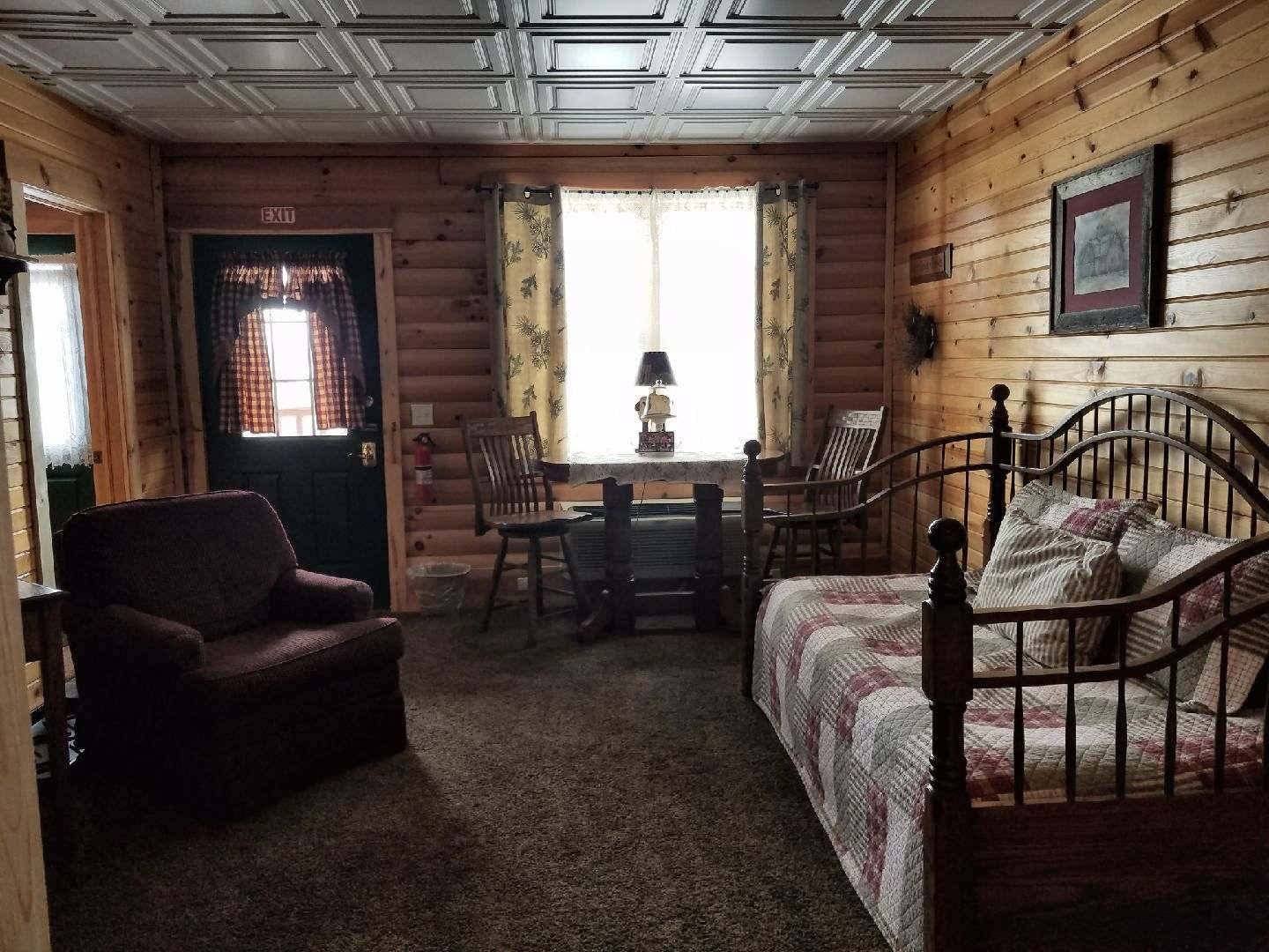 Cabin (The Friends/Family Suite) | Living area | Flat-screen TV, fireplace, DVD player