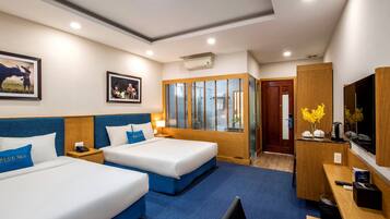 Family Room, 2 Queen Beds, Non Smoking | Minibar, in-room safe, desk, blackout curtains