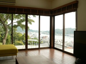 Private Vacation Home | Living area | Flat-screen TV, fireplace, DVD player - Saka no Kaze (Onomichi)