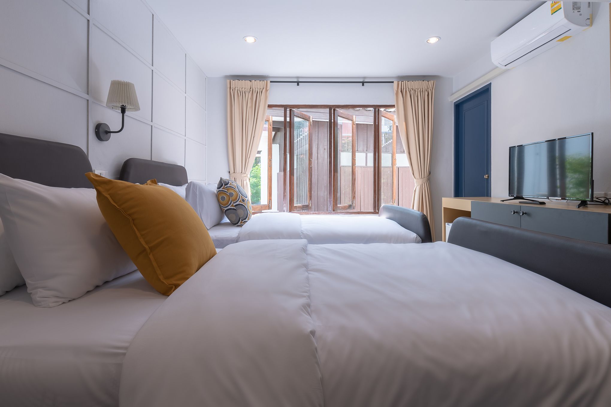 ห้องทวิน | ผ้าม่านกันแสง, Wi-Fi ฟรี, ผ้าปูที่นอน