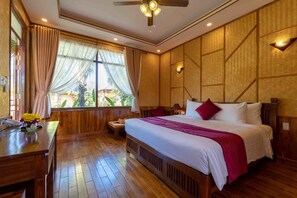 Bungalow, Garden View | Minibar, in-room safe, laptop workspace, soundproofing - Phu Quoc Bambusa Resort (Phu Quoc)