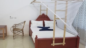 Desk, iron/ironing board (on request), WiFi (free), bed sheets - Kilimanjaro Lodge (Nungwi)