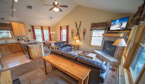 Premier Townhome, 2 Bedrooms, Patio, Resort View (Snake River 26) | Living area | 40-inch flat-screen TV with cable channels, TV, fireplace - Snake River 26 (Keystone)