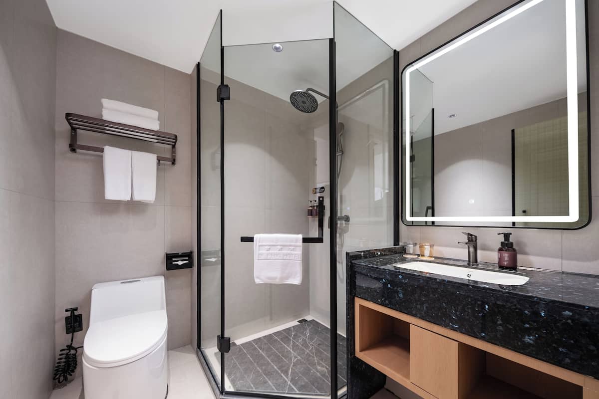 rainfall showerhead, free toiletries, hair dryer, slippers