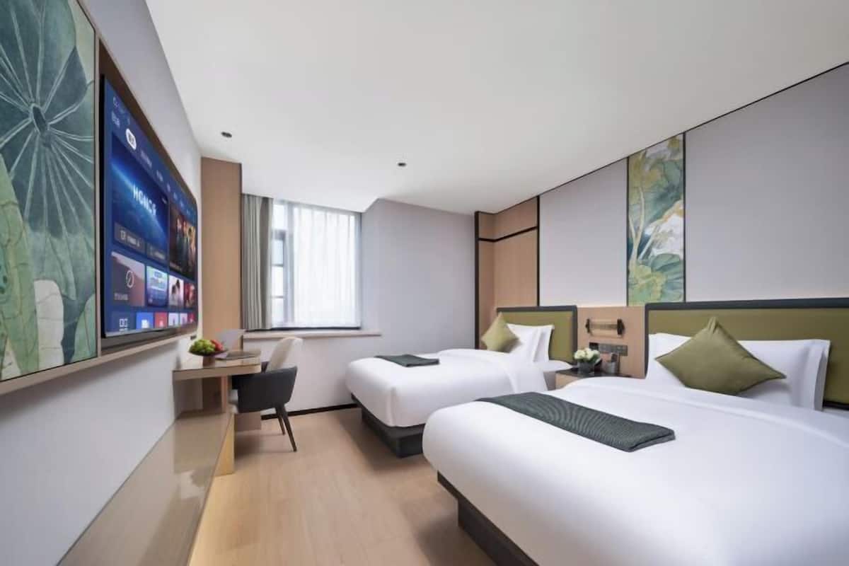 Premium bedding, down duvets, desk, laptop workspace