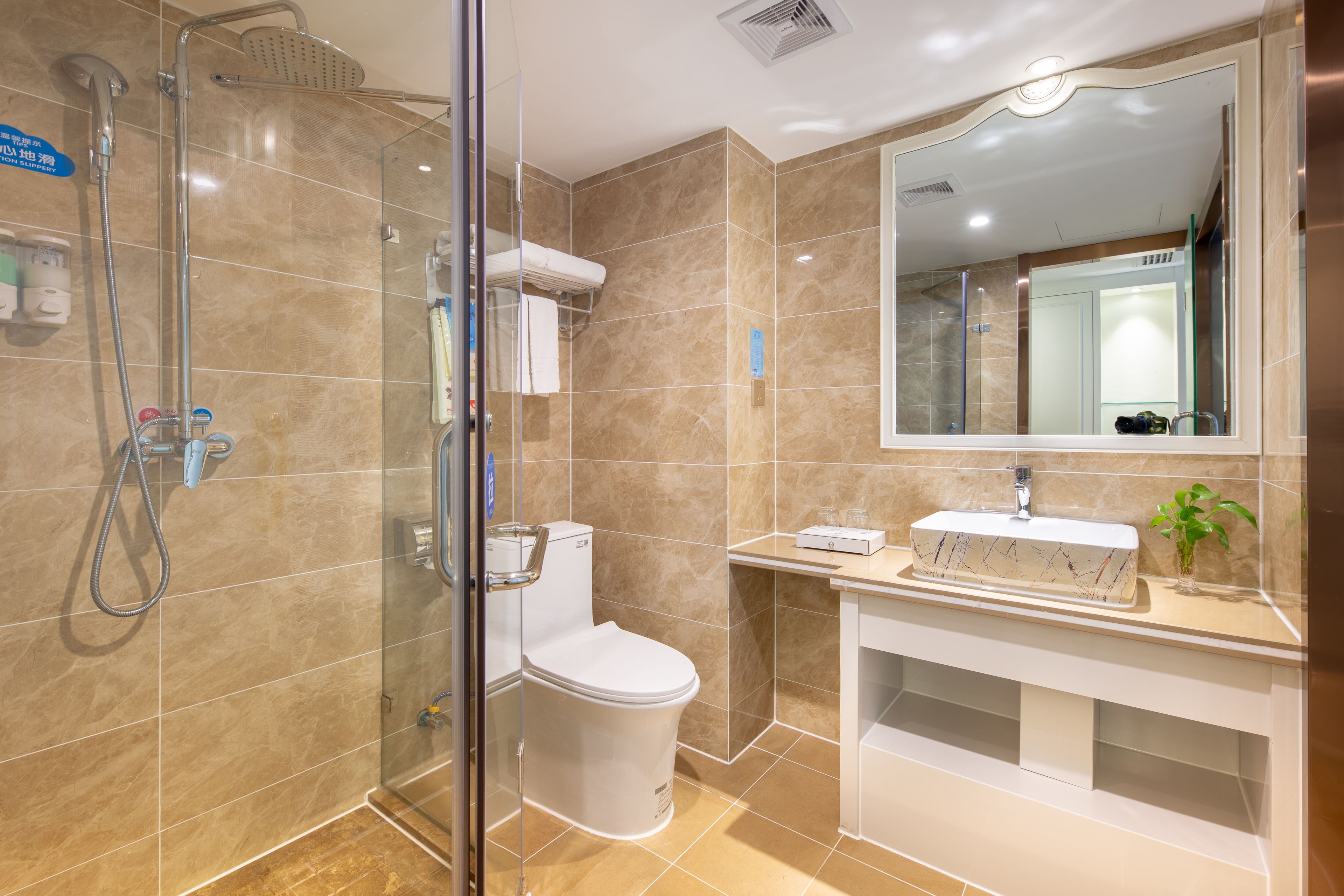 rainfall showerhead, free toiletries, hair dryer, slippers