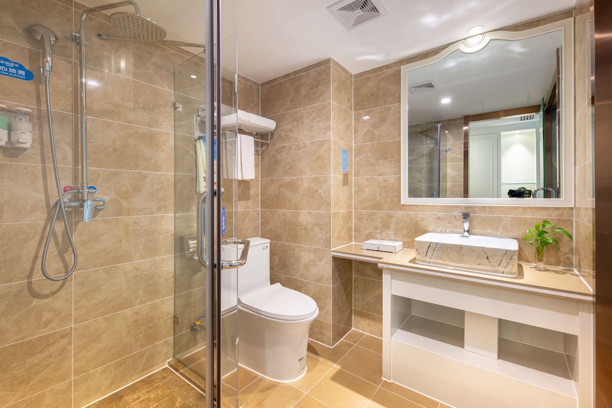 rainfall showerhead, free toiletries, hair dryer, slippers