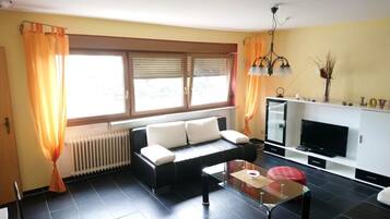 Apartment (ROMA) | Living area | Flat-screen TV