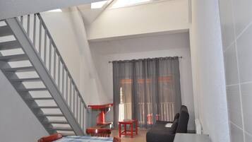 Duplex, 3 Bedrooms, Non Smoking (6-8 pax.) | Living area | Flat-screen TV