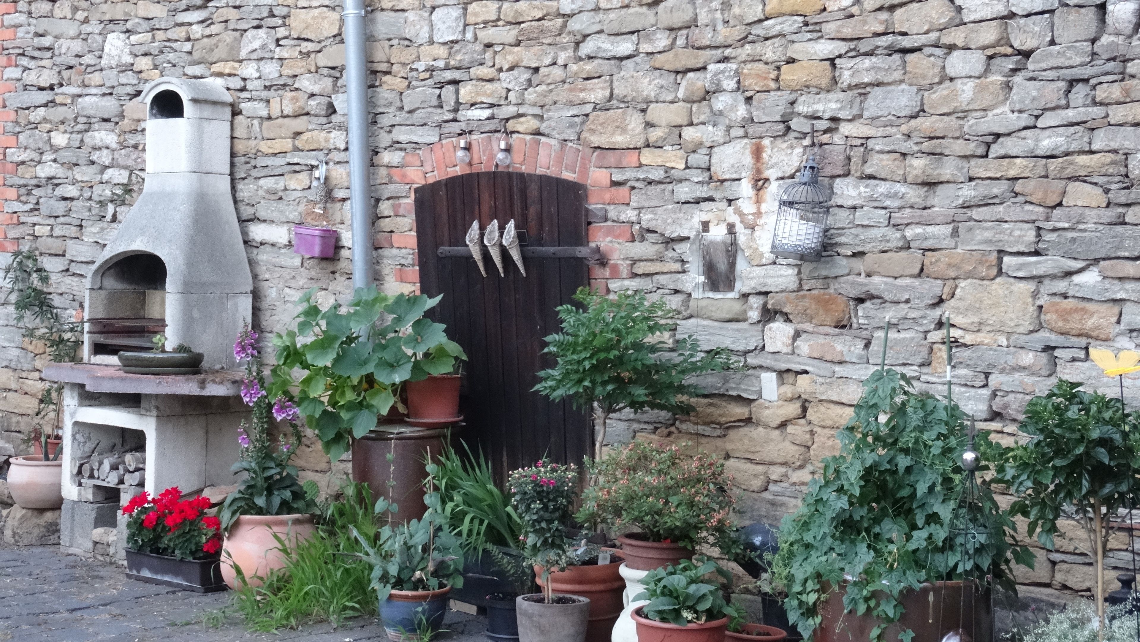 Premium studio, 1 kingsize bed, open haard, uitzicht op tuin | Uitzicht op de binnenplaats