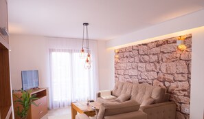 Exclusive Apartment, Multiple Beds, Non Smoking | Living area