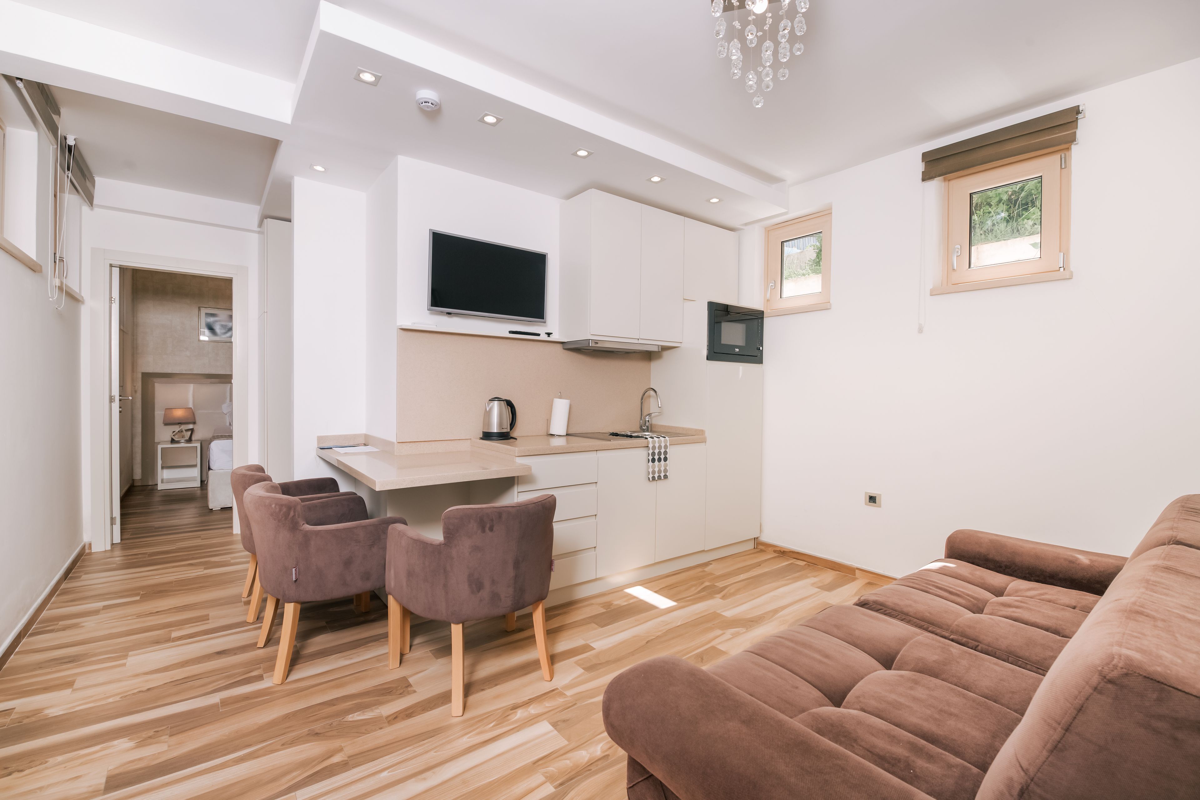 Appartement Deluxe (Ground Floor) | Coin séjour | Télévision LCD de 81 cm avec chaînes par câble, télévision