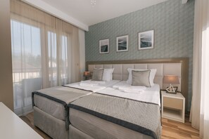 Căn hộ Deluxe, hiên | Bộ đồ giường cao cấp, bàn, phòng cách âm 