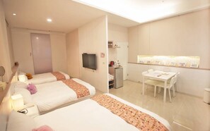 Desk, blackout curtains, free WiFi, bed sheets