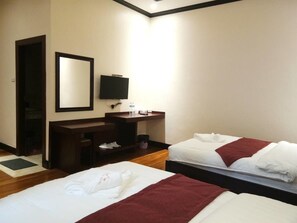 Habitación Deluxe con 2 camas individuales | Cortinas opacas, sistema de insonorización, wifi gratis y ropa de cama