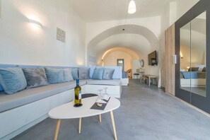 Traditional Suite, Sea View (Illusion) | Living area | Flat-screen TV