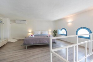 Comfort Suite, Ocean View (Simplicity) | Living area | Flat-screen TV